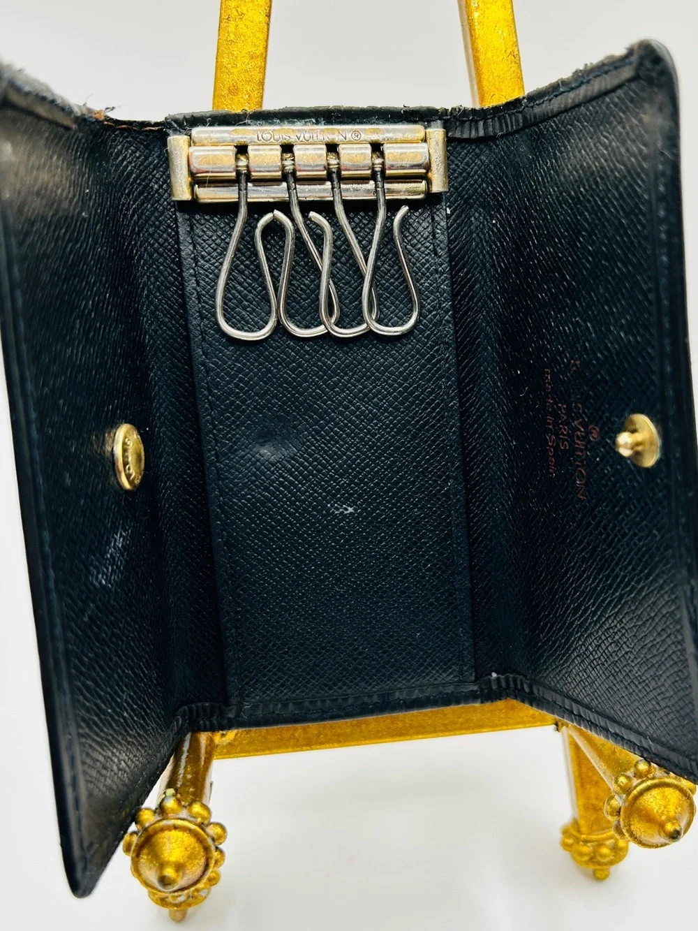 Louis Vuitton Black Epi Textured Four Key Holder with Brass Accents Fair/Good
